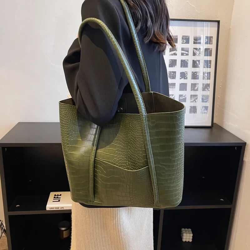 Borsa a tracolla in pelle di coccodrillo da donna