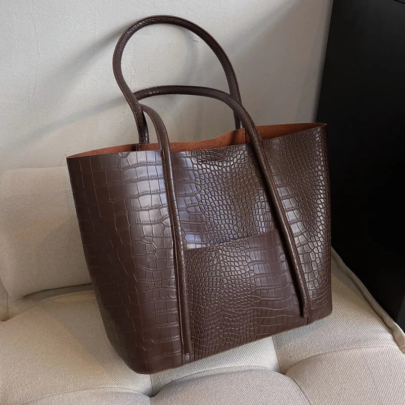Borsa a tracolla in pelle di coccodrillo da donna