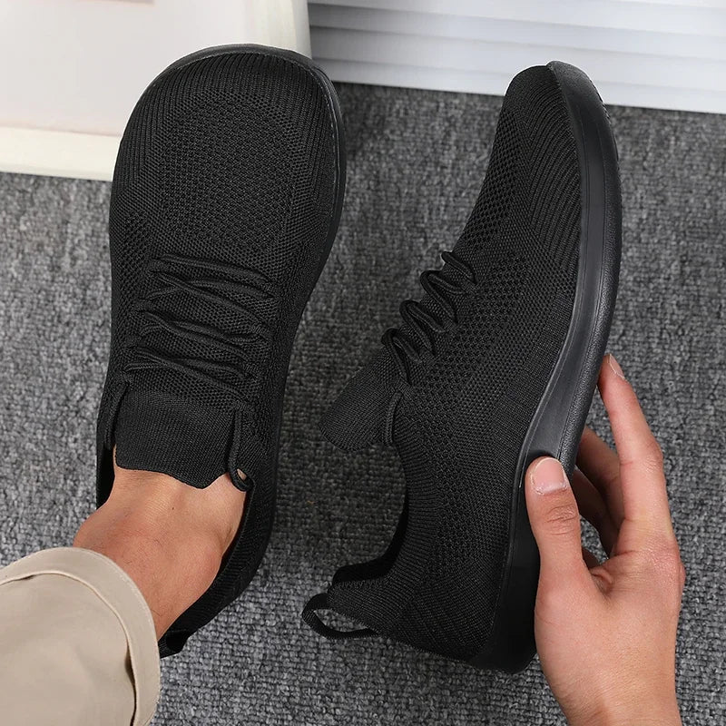 Sneakers uomo in mesh traspirante con suola ammortizzata - Leggere e comode