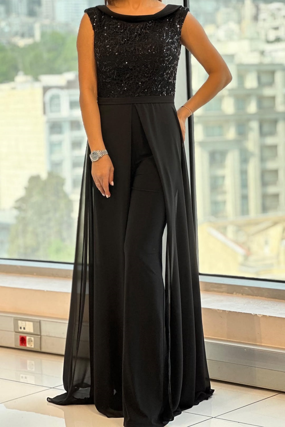 Tuta in tulle testurizzato – Elegante tuta con gambe larghe in rete trasparente