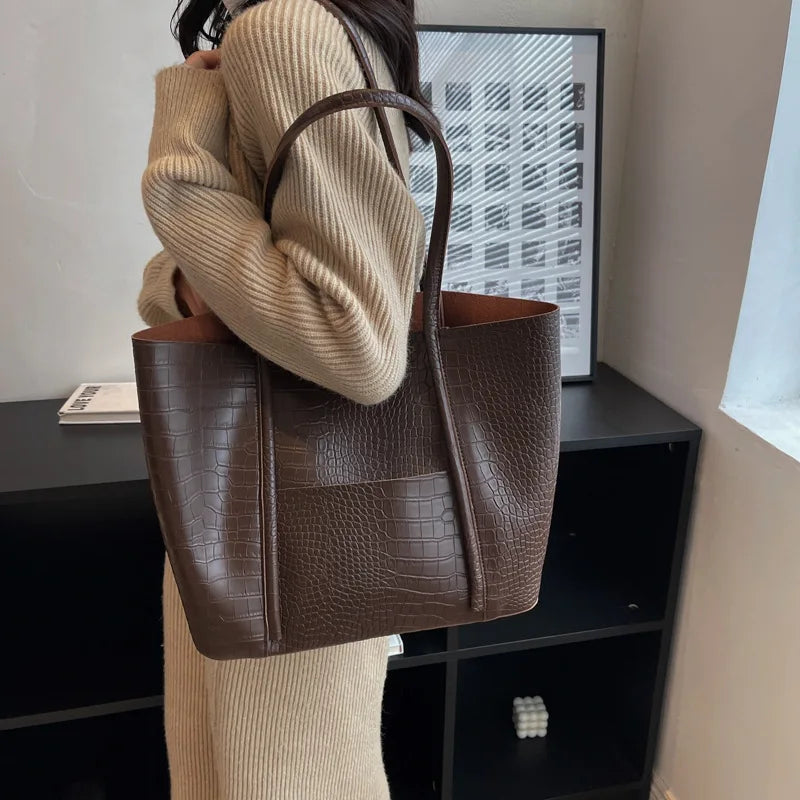 Borsa a tracolla in pelle di coccodrillo da donna