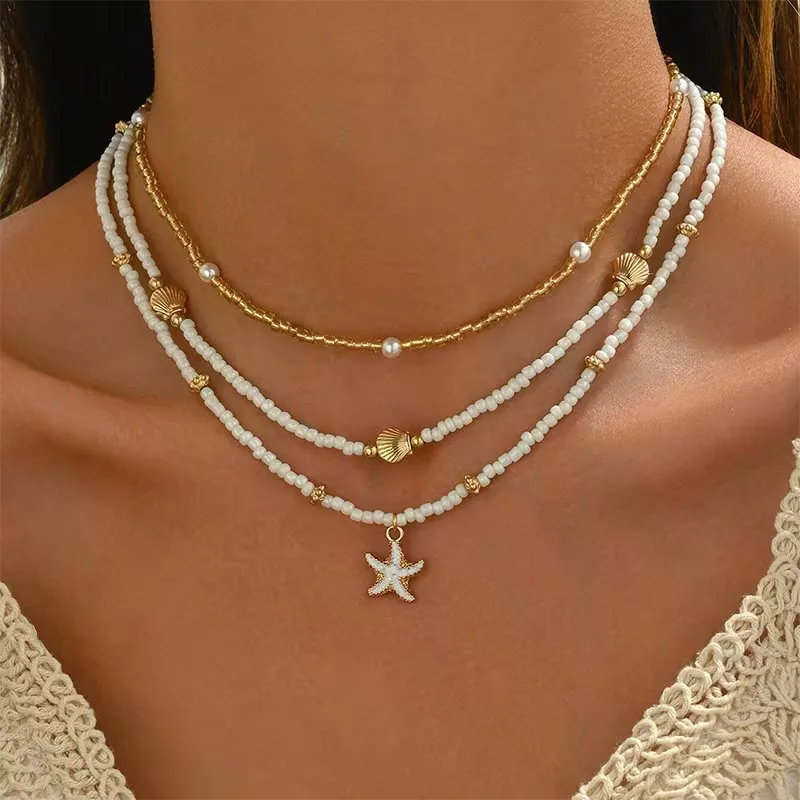 Collana con conchiglia e stella - Delicata ed estiva