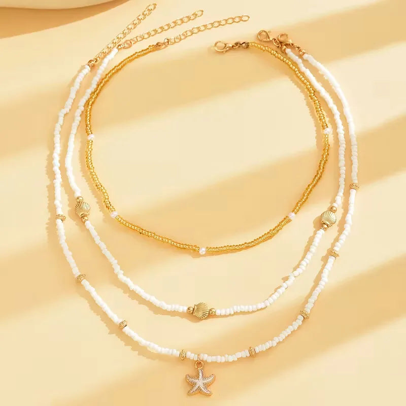 Collana con conchiglia e stella - Delicata ed estiva