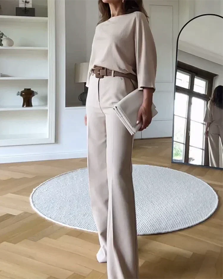 Elegante completo da donna in due pezzi - top con maniche a pipistrello e pantaloni a gamba larga