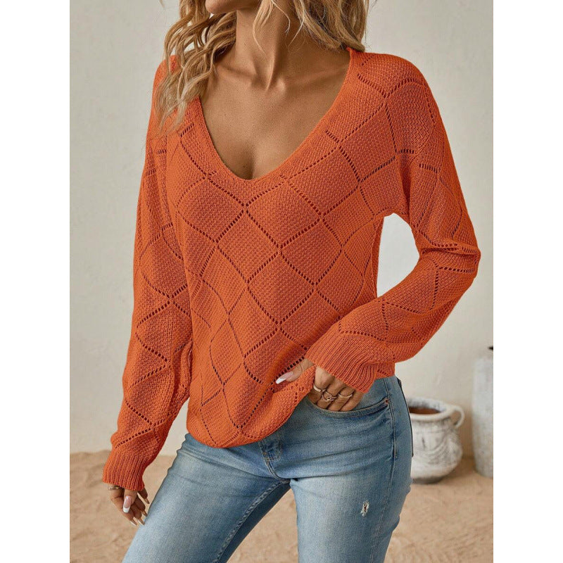 Ensfarvet sweater med pufærmer - Blød og feminin