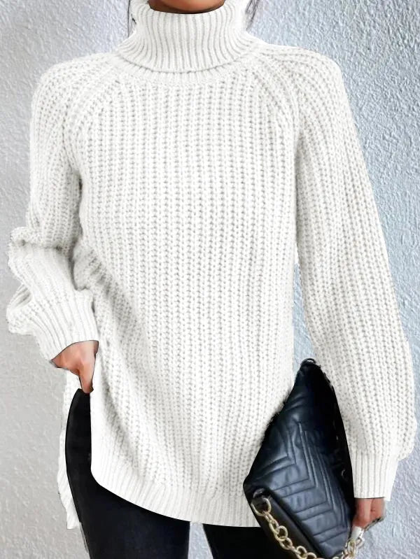 Maglione dolcevita da donna con maniche raglan e orlo spaccato