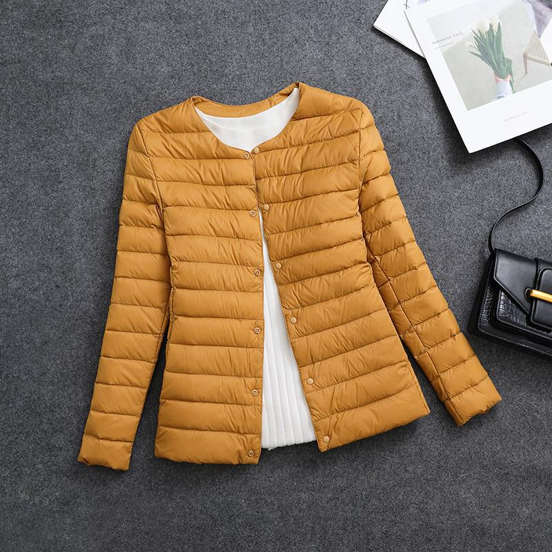 Giacca isolante leggera da donna – Indumento interno corto con scollo rotondo