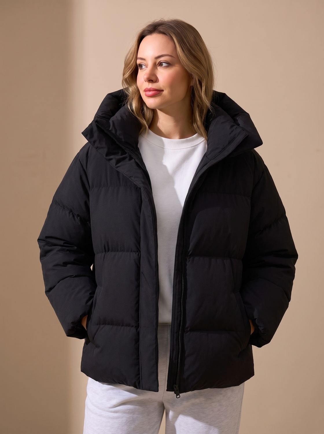 Piumino oversize donna con cappuccio - Caldo e moderno