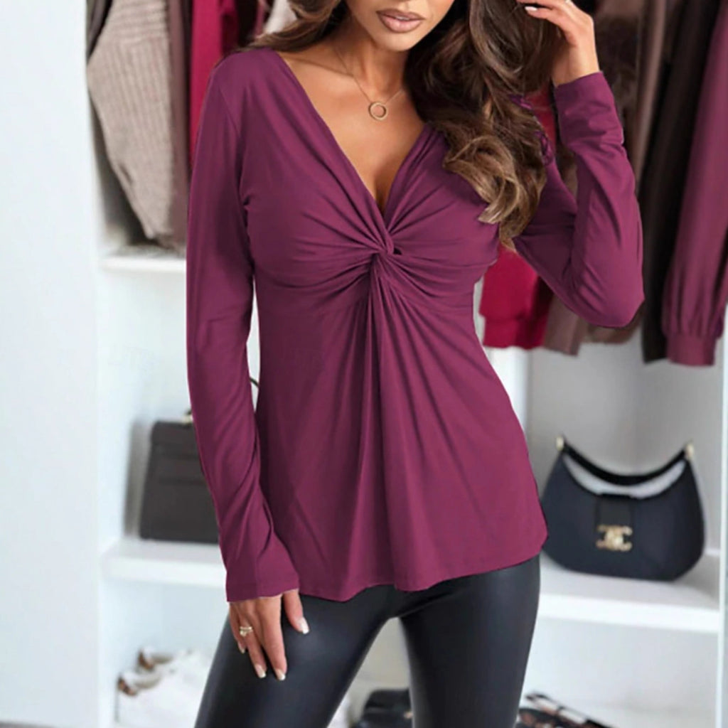 Solid-color women's top with long sleeves, a V-neck, and pleats – Fluid and elegant