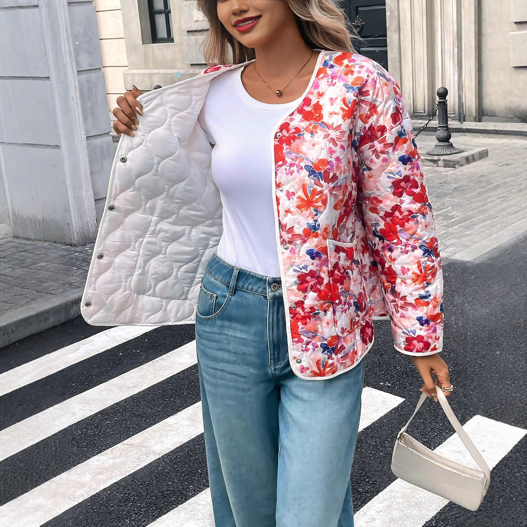 Blusa donna stampata con bottoni e tasche dal taglio morbido