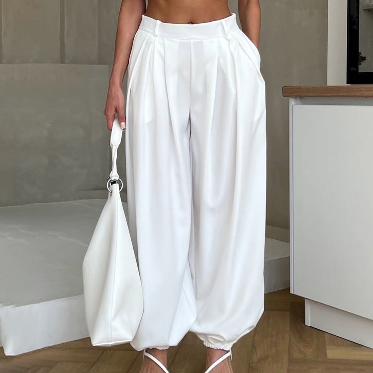 Pantaloni donna bianchi a vita alta dal taglio ampio