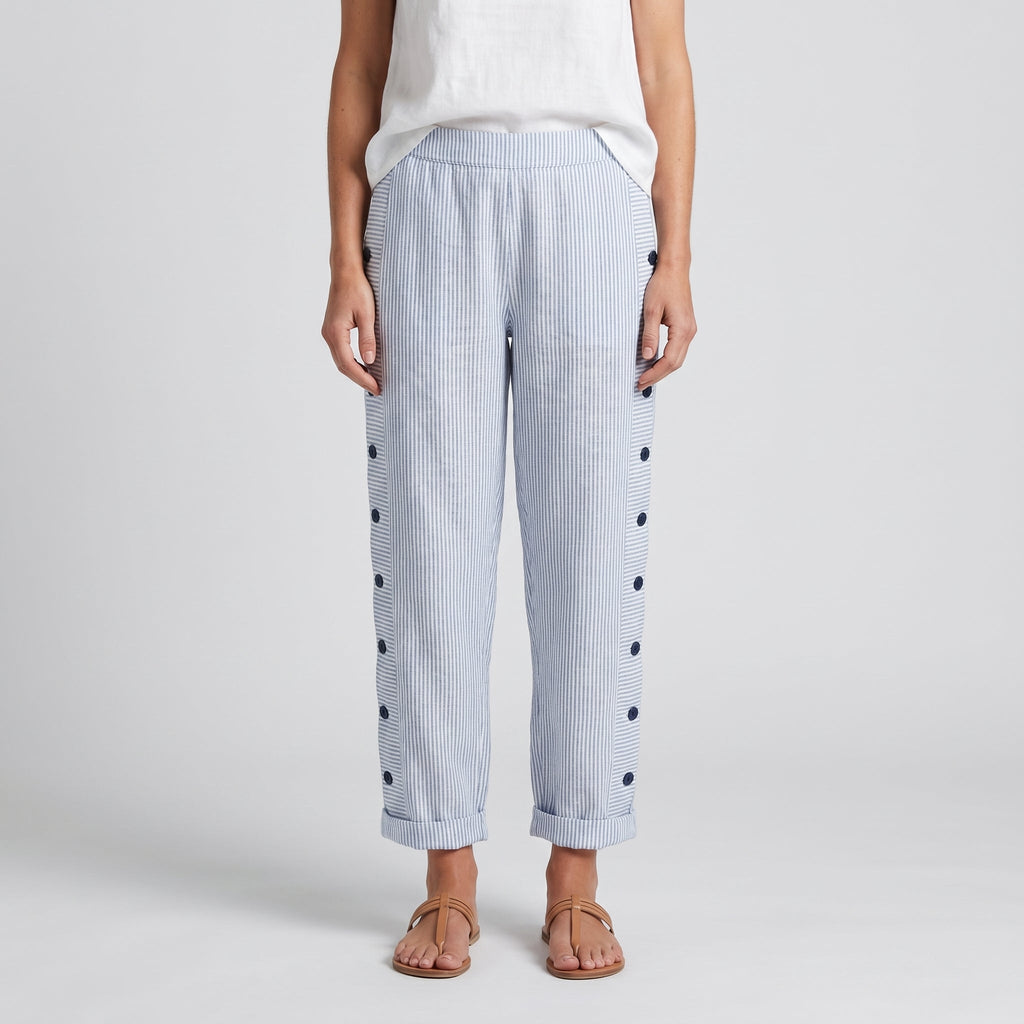 Pantaloni donna a righe con bottoni a contrasto - Chic e fluidi