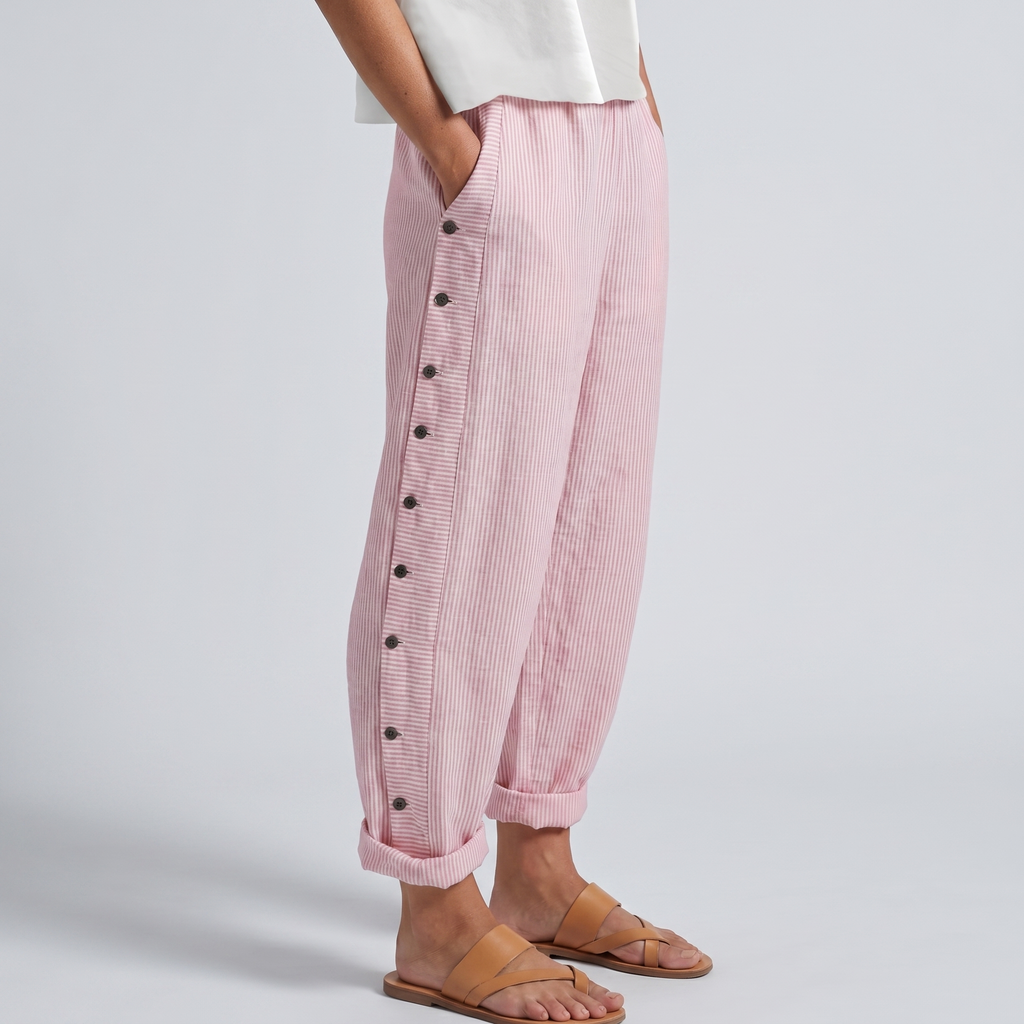 Pantaloni donna a righe con bottoni a contrasto - Chic e fluidi